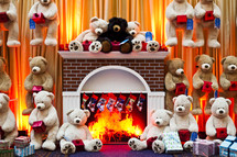 teddy bears in front of a fireplace with stockings hanging on the mantle christmas holiday