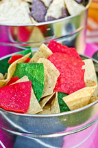 A bucket of colorful tortilla chips Mexican food bucket