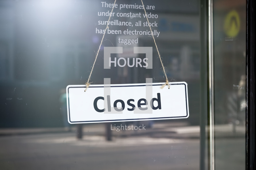 closed sign on a shop door 