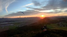 Freedom of paragliding fly, Evening sunset landscape nature, Adrenaline adventure, Follow cam
