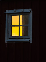 Golden light through window at sunset