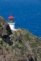 red roofed lighthouse 