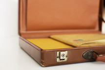 folders and envelopes in a briefcase 