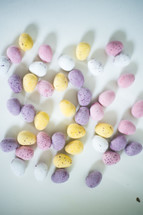 Easter egg candy on white background 
