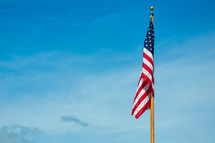 an American flag on a flagpole 