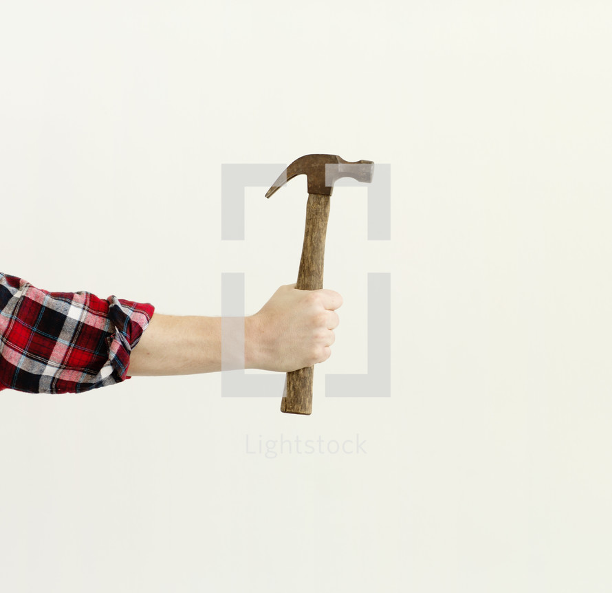 man holding a hammer