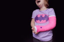 a girl child in a cast 