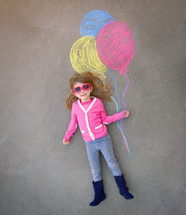 a little girl in sunglasses holding sidewalk chalk balloons 