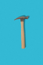 hammer against a blue background 