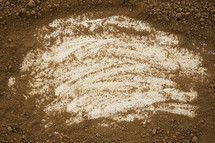 wiped clean, dirt background 