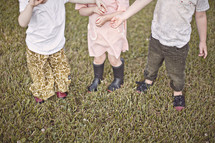 children in rain boots