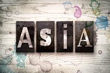 word Asia on wood background 