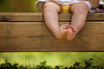 legs and feet of an infant girl