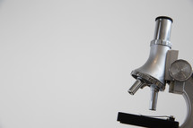 microscope against a white background 