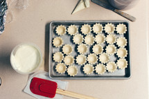 tart shells in a baking pan 