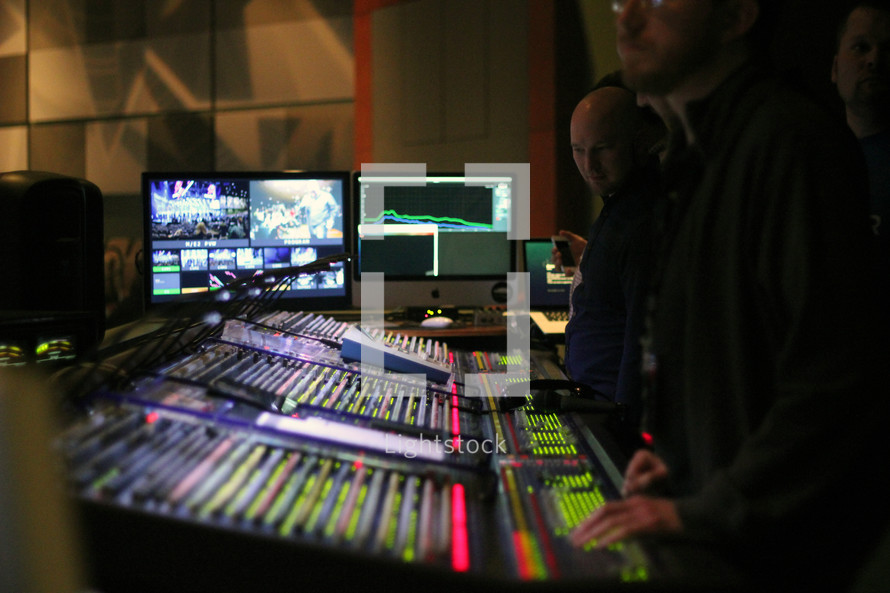 video production crew -- sound board operators 