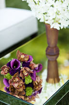 Flower bouquets on glass table purple, brown, green, lounge, floral