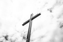 cross against clouds in the sky 