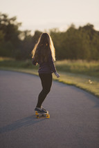 teen girl on a skateboard