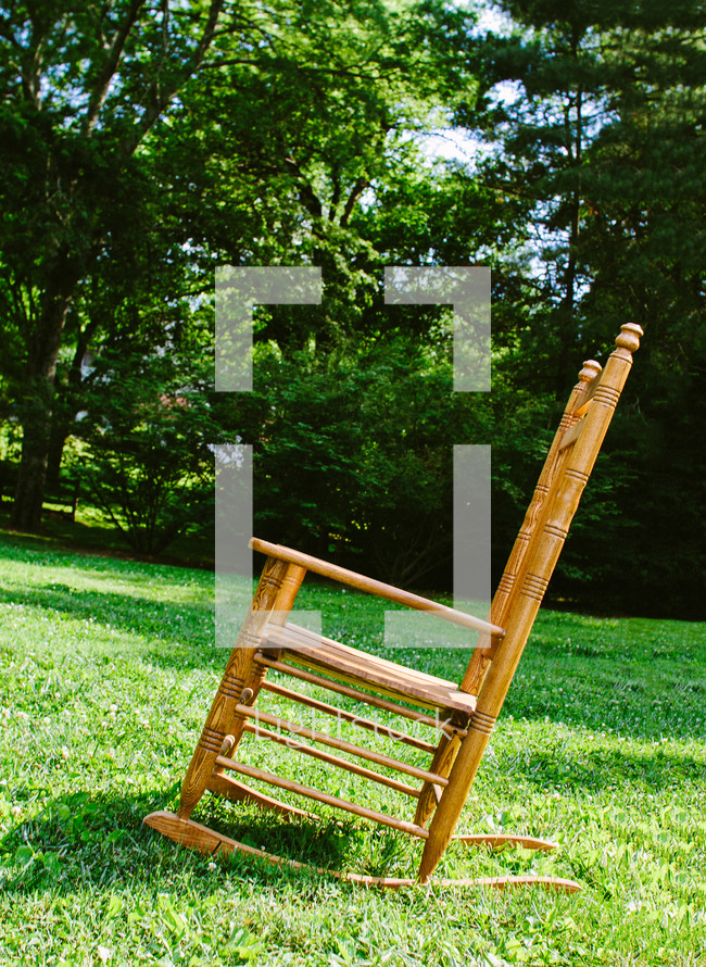 rocking chair in grass