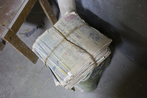 bundled stack of newspaper 