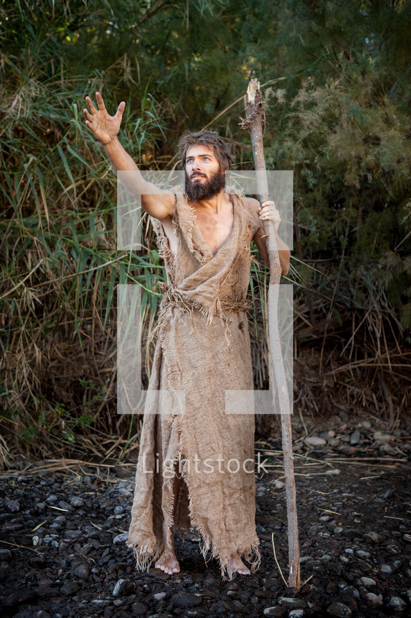 John the Baptist with a staff in the wilderness ready to baptize and prepare the way for the coming King. Voice of calling in the wilderness. Dedicated disciple and biblical character follower of jesus. Moses crossing the Red Sea, Moses staff.