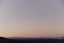 mountains in the horizon at sunset 