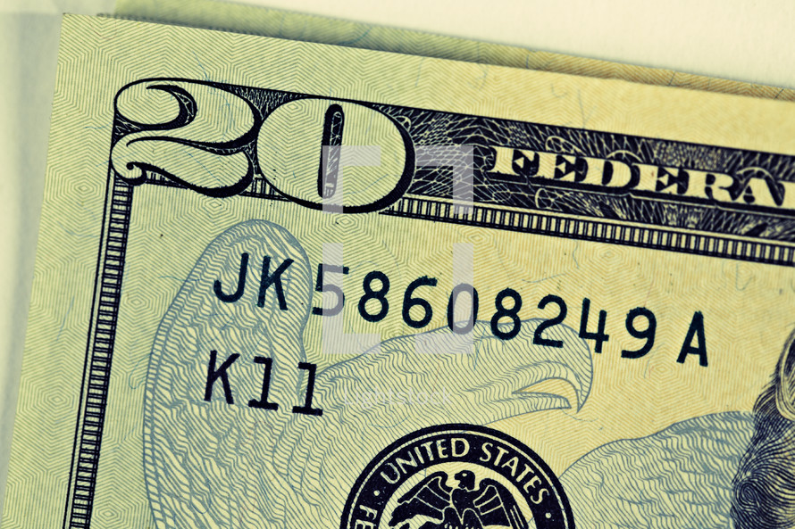 A close up of a twenty dollar bill