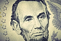 Abraham Lincoln on a five dollar bill