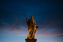 angel statue in Rome at dusk 