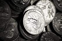 A closeup of a group of quarters