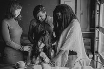 group prayer at a Bible study 