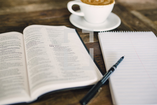 Cappuccino and an open bible and notepad and pen — Photo — Lightstock