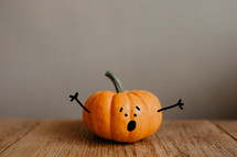 a surprised little pumpkin