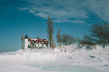 lighthouse in the snow 