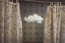 vintage cupboard with old curtains and tiny cloud