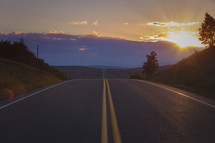 sunset over a road 