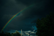 a rainbow in a gray sky