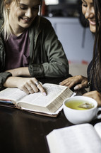 girls reading Bibles at a Bible study 