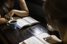 girls discussing scripture at a Bible study 