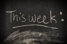 This week written on a chalkboard in chalk 