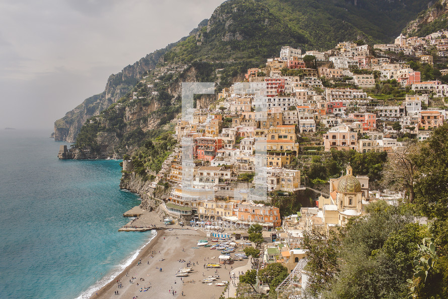 homes on cliffs of a coastal town in Italy 