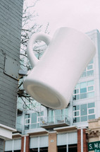 large coffee mug sign 