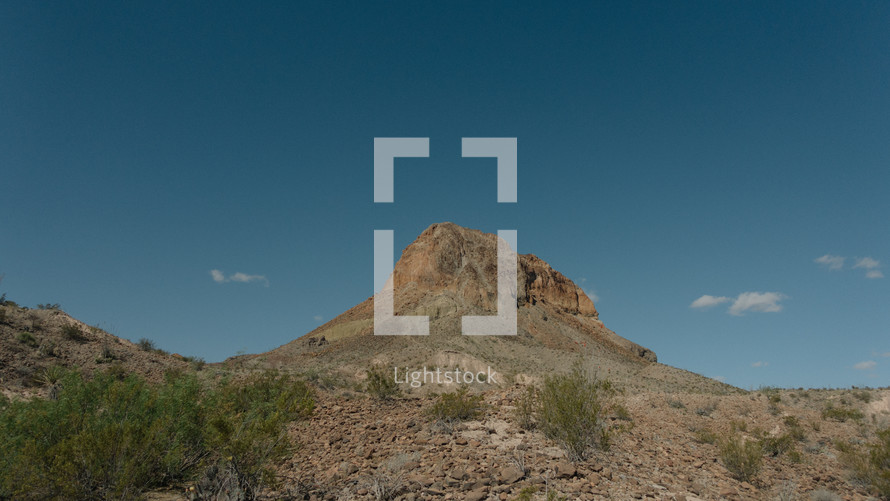a rock peak in the desert 