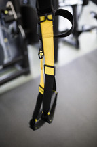 TRX fitness straps at a gym