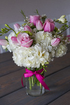pink and white flowers in a vase 