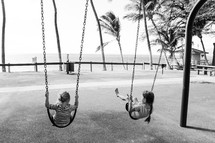 girls on a swing 