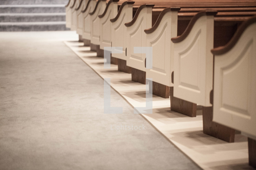 Center aisle with rows of pews.