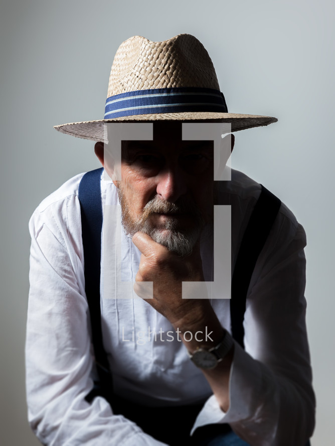 senior man in a hat 