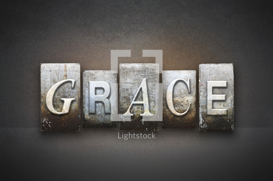 Stone tiles spelling the word GRACE.
